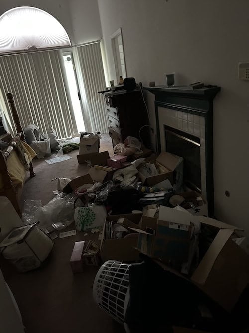 Interior of a hoarder house in Southern California before being purchased by Exclusive SoCal Home Buyers.