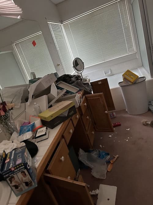 Interior view of a trashed house in Southern California before cleanup and renovation by Exclusive SoCal Home Buyers.